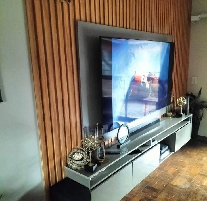 Timber slat feature wall with mounted TV and media unit